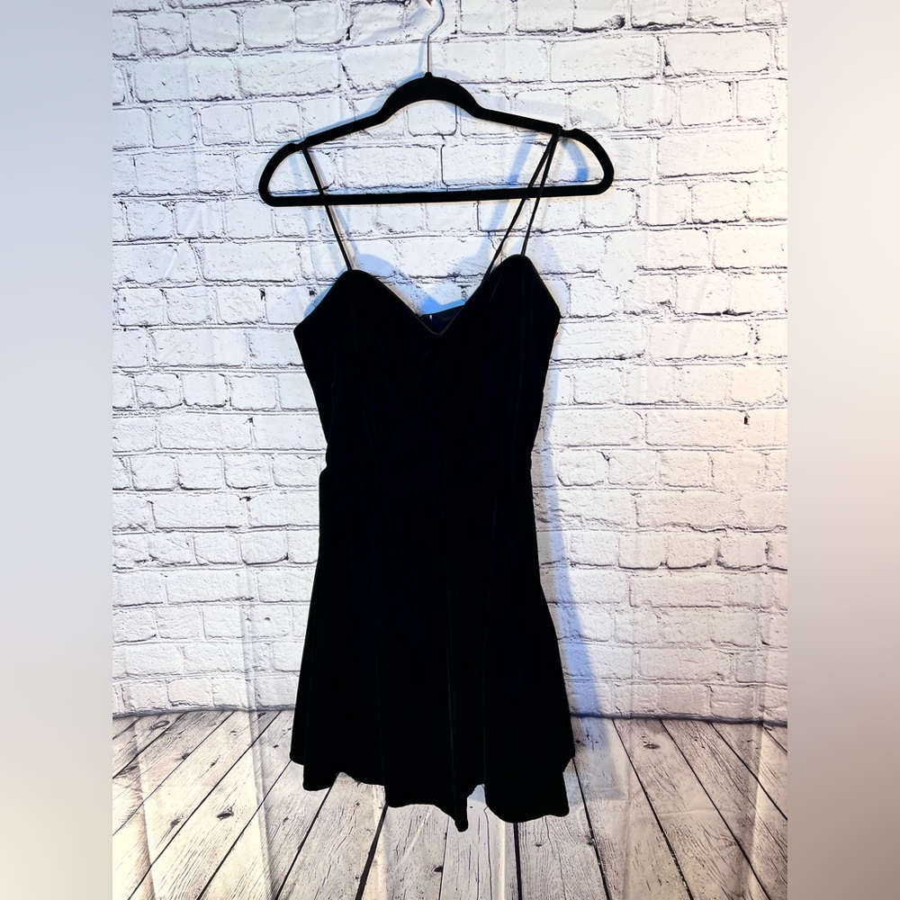 Judy’s.  New Ladies Black Short velvet evening dress with flare. Size 11/12